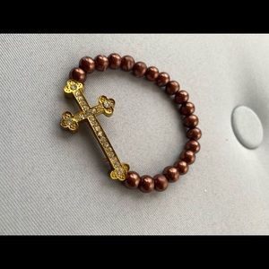 Brown and gold cross bracelet